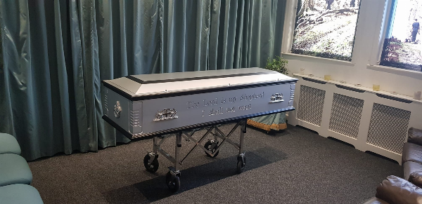 Personalised coffin. Wording, symbol, and colouring chosen by you for your loved one