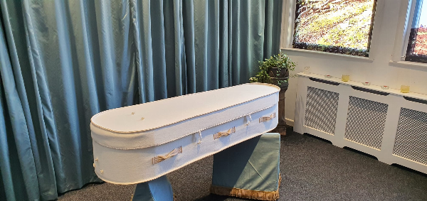 Woollen coffin. Has a feel of a fleece blanket.